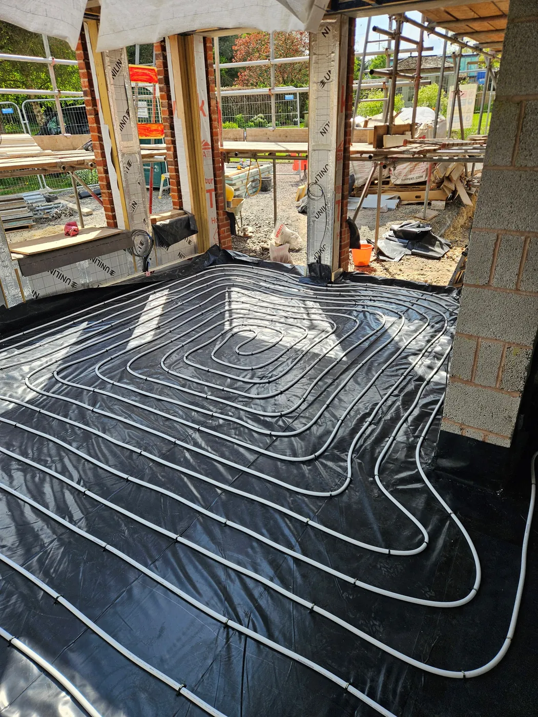 Underfloor heating pipework during installation